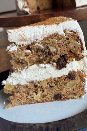 Amazin' Raisin Cake frosted with cream cheese stabilized whipped cream and cinnamon