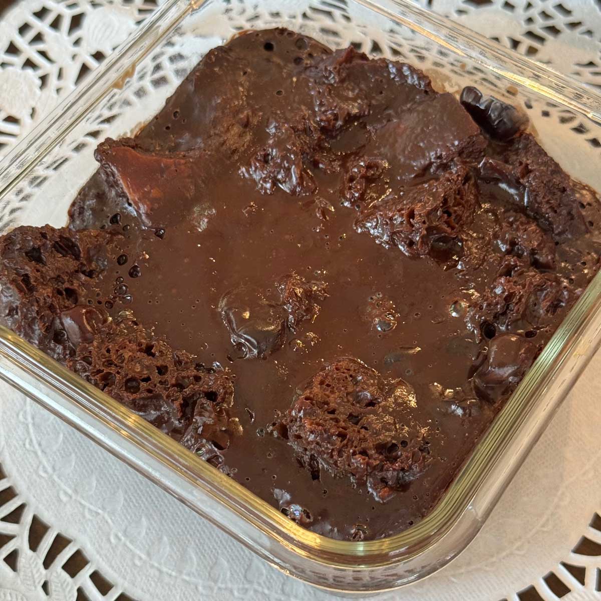 Chocolate Bread Pudding made with melted Ghirardelli chips, dried cherries and sourdough bread.