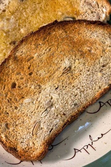 Dakota Bread sliced and toasted with butter.