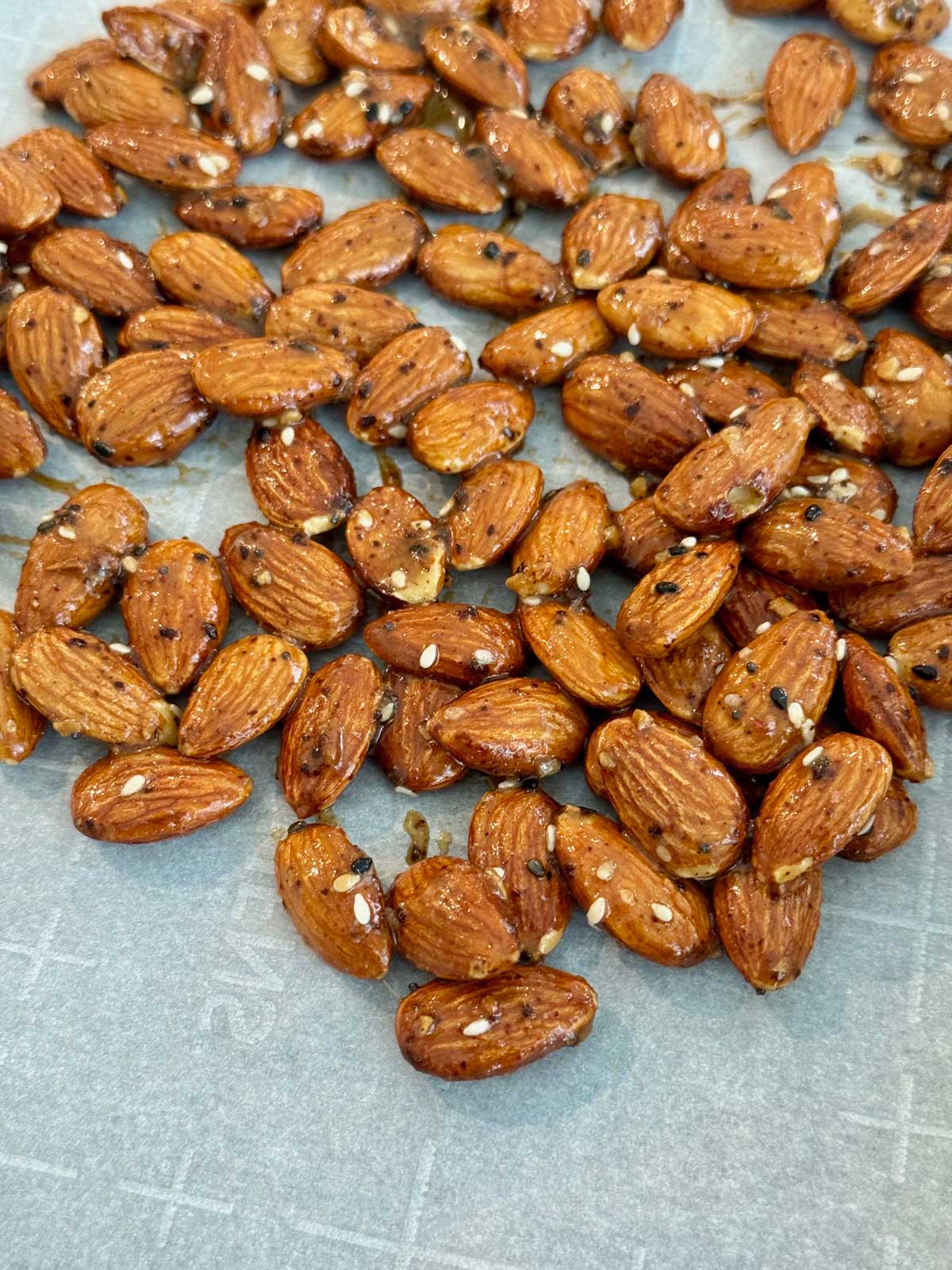 Roasted almonds tossed with egg white, Worcestershire sauce, Aleppo, Everything Seasoning and other things.