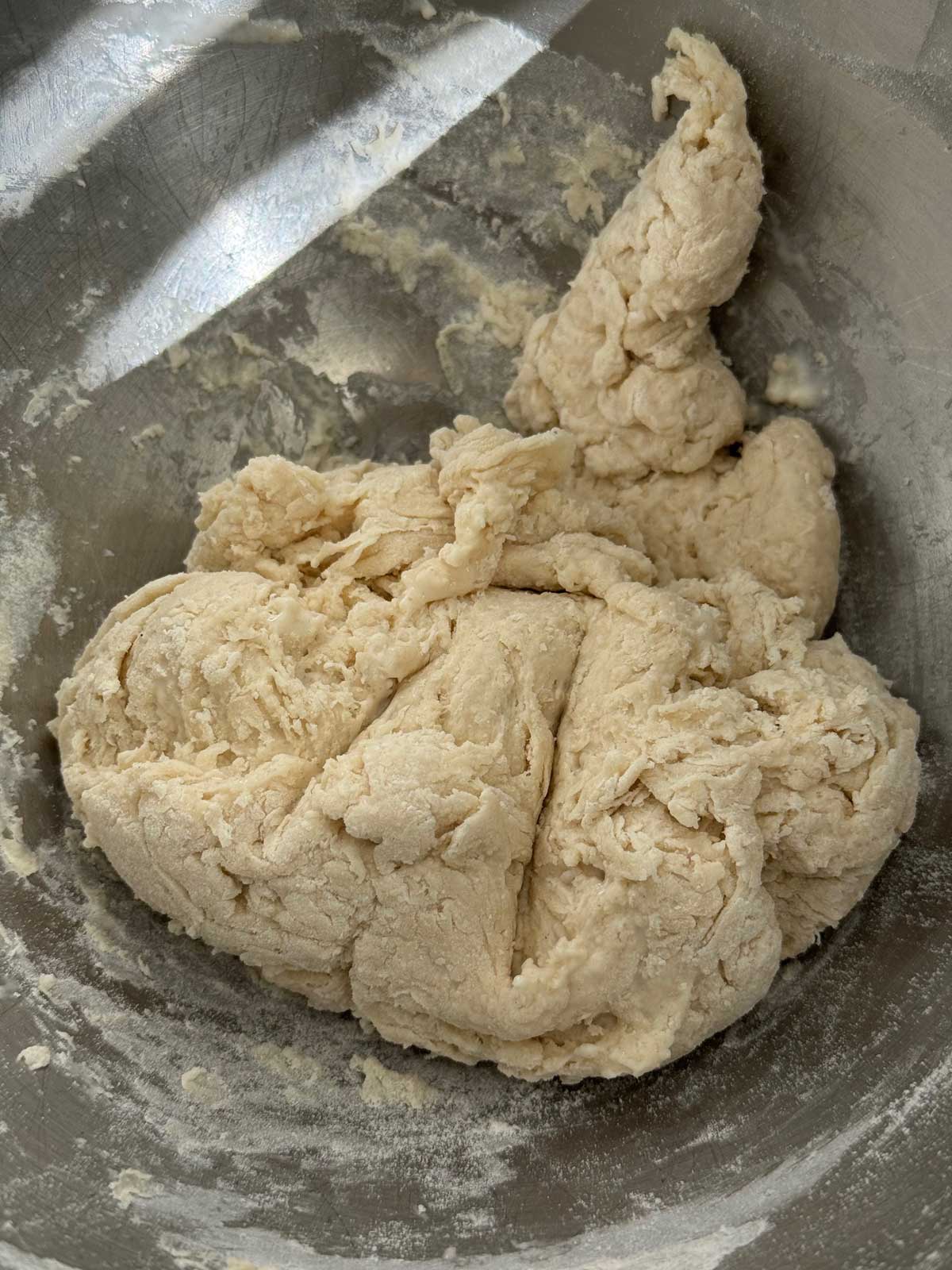 Scraggly dough ready to knead