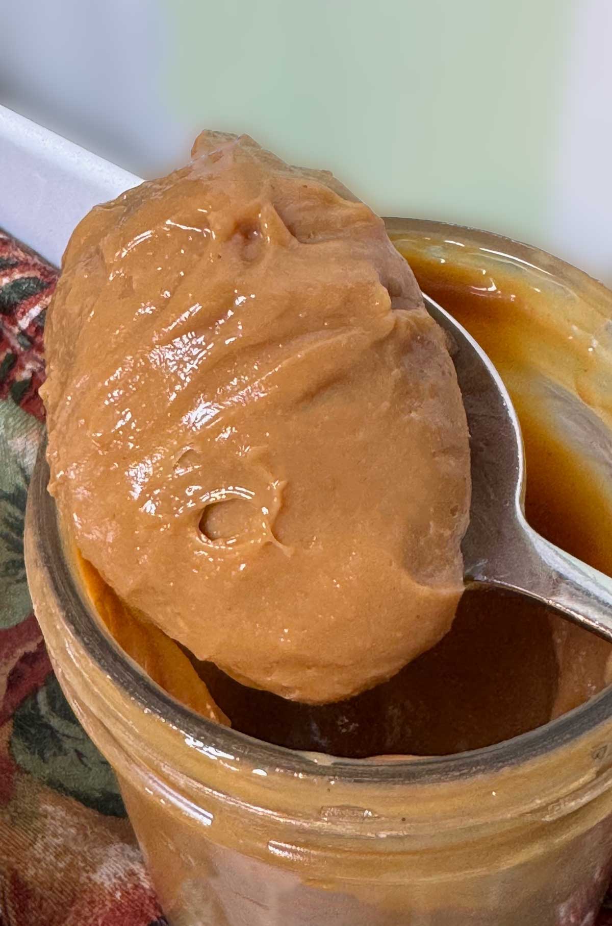 A spoonful of dulce de leche to be used as a filling for Colombian style bakery Alfajores.