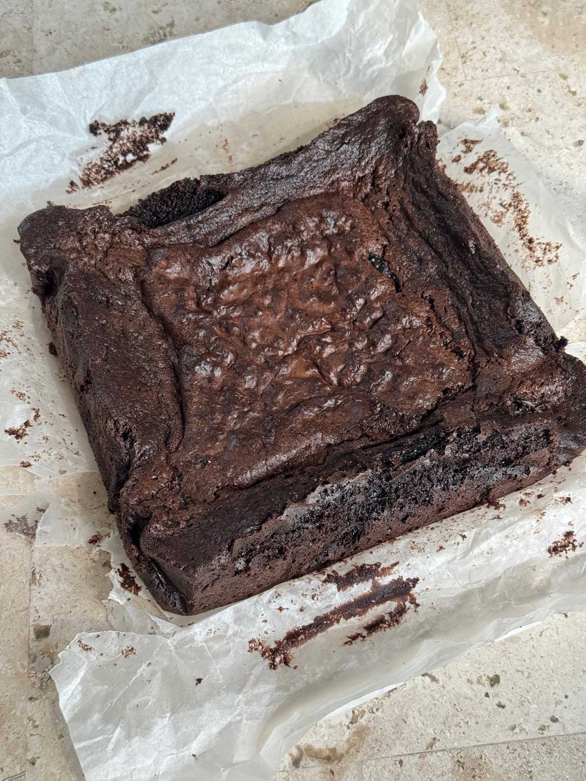 Simple Self-Rising Flour Brownies on a piece of parchment paper.