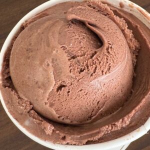 homemade chocolate ice cream made with allulose and high protein milk.