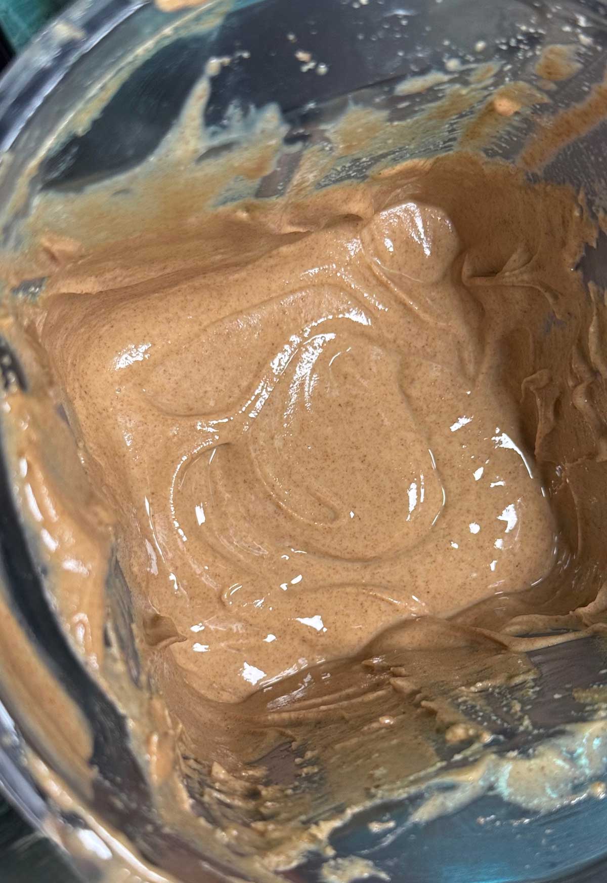 Smooth and creamy mixed nut butter in a Vitamix5200 blender container