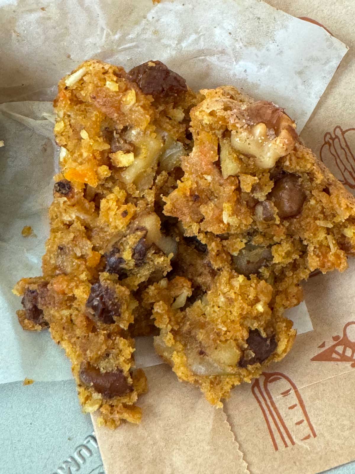 Vegan Carrot Coconut Muffin split to show moist texture