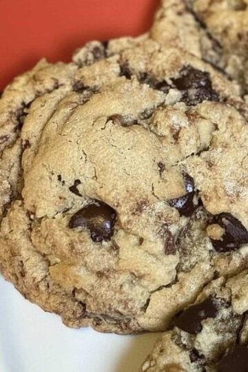 Chocolate chip cookies called Neiman Marcus Cookies made with ground oats and grated milk chocolate.
