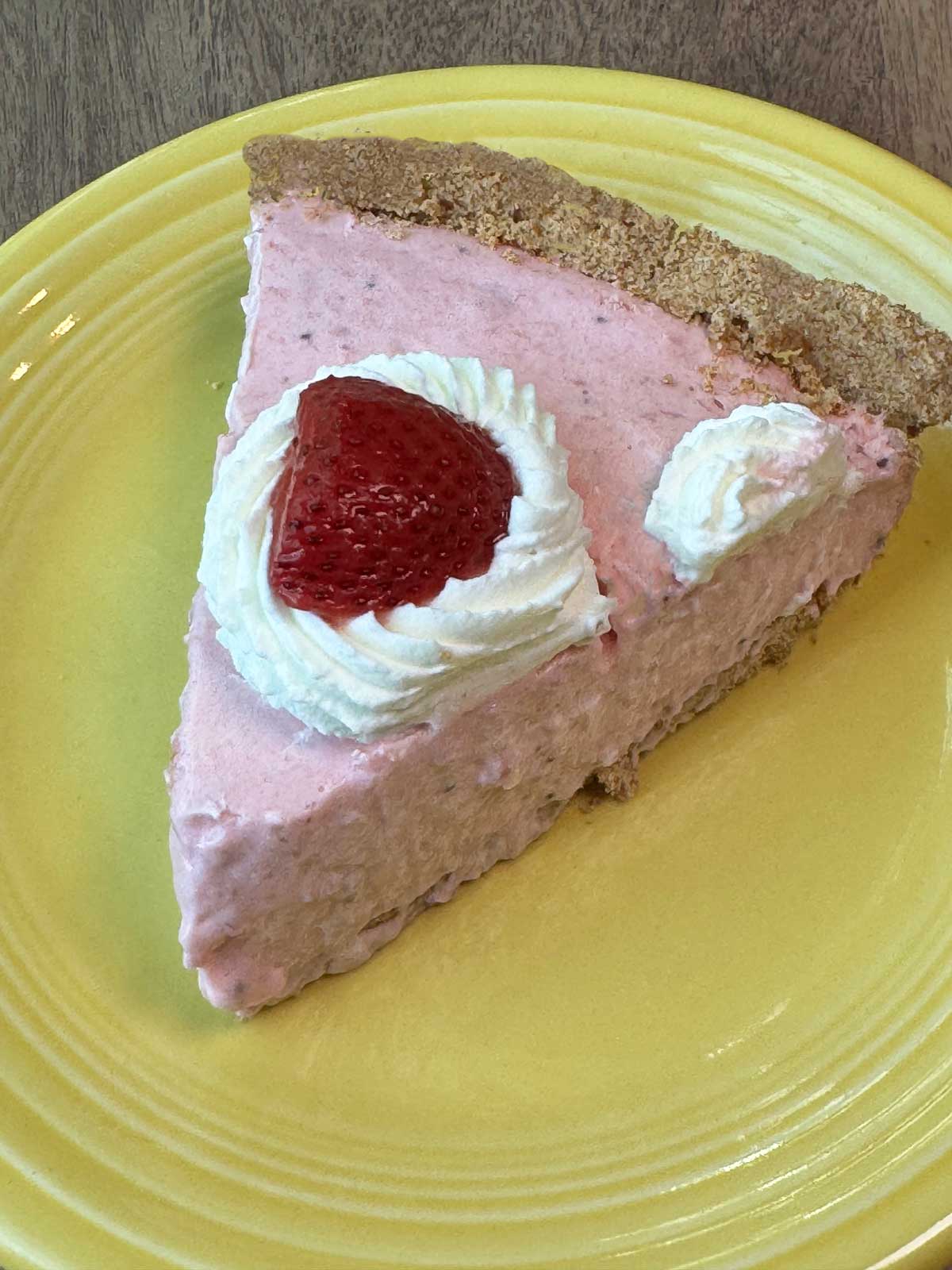 Springtime Strawberry Pie Slice on a yellow plate.