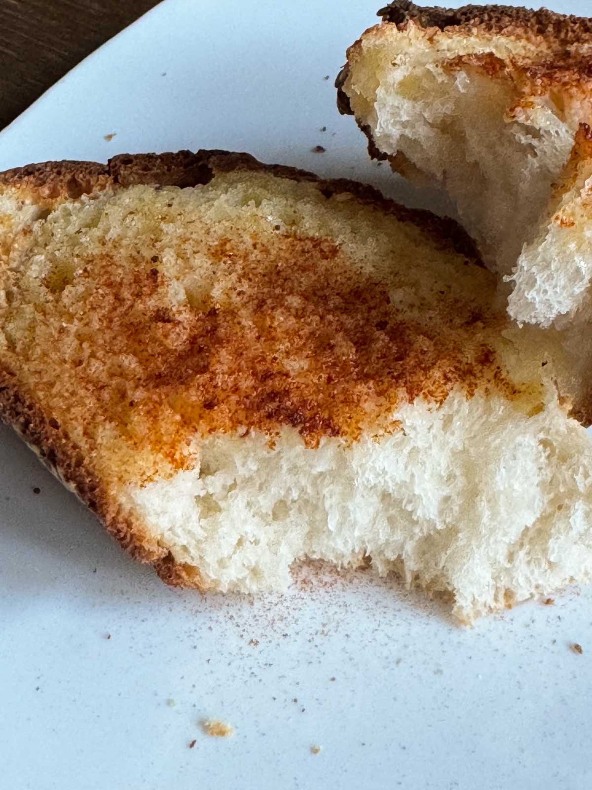 Garlic bread with a fluffy interior.