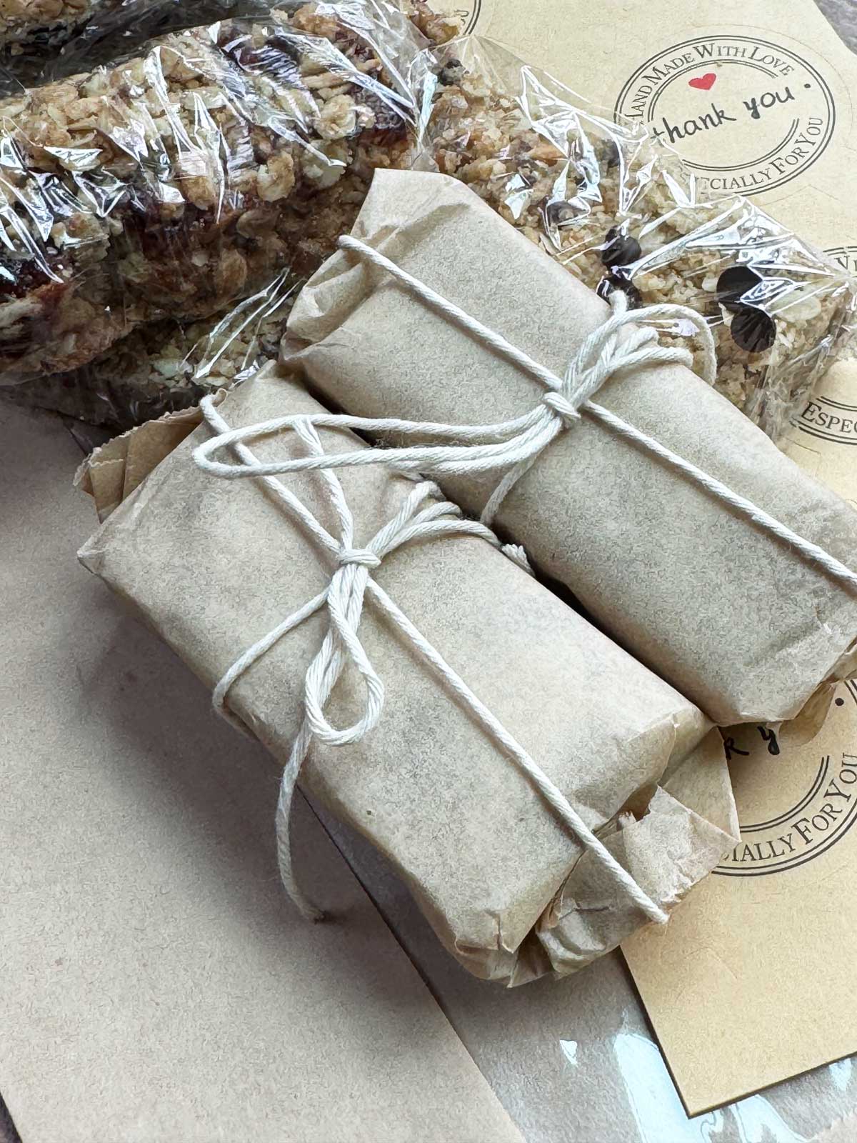 Oatmeal bars wrapped in parchment paper and twine.