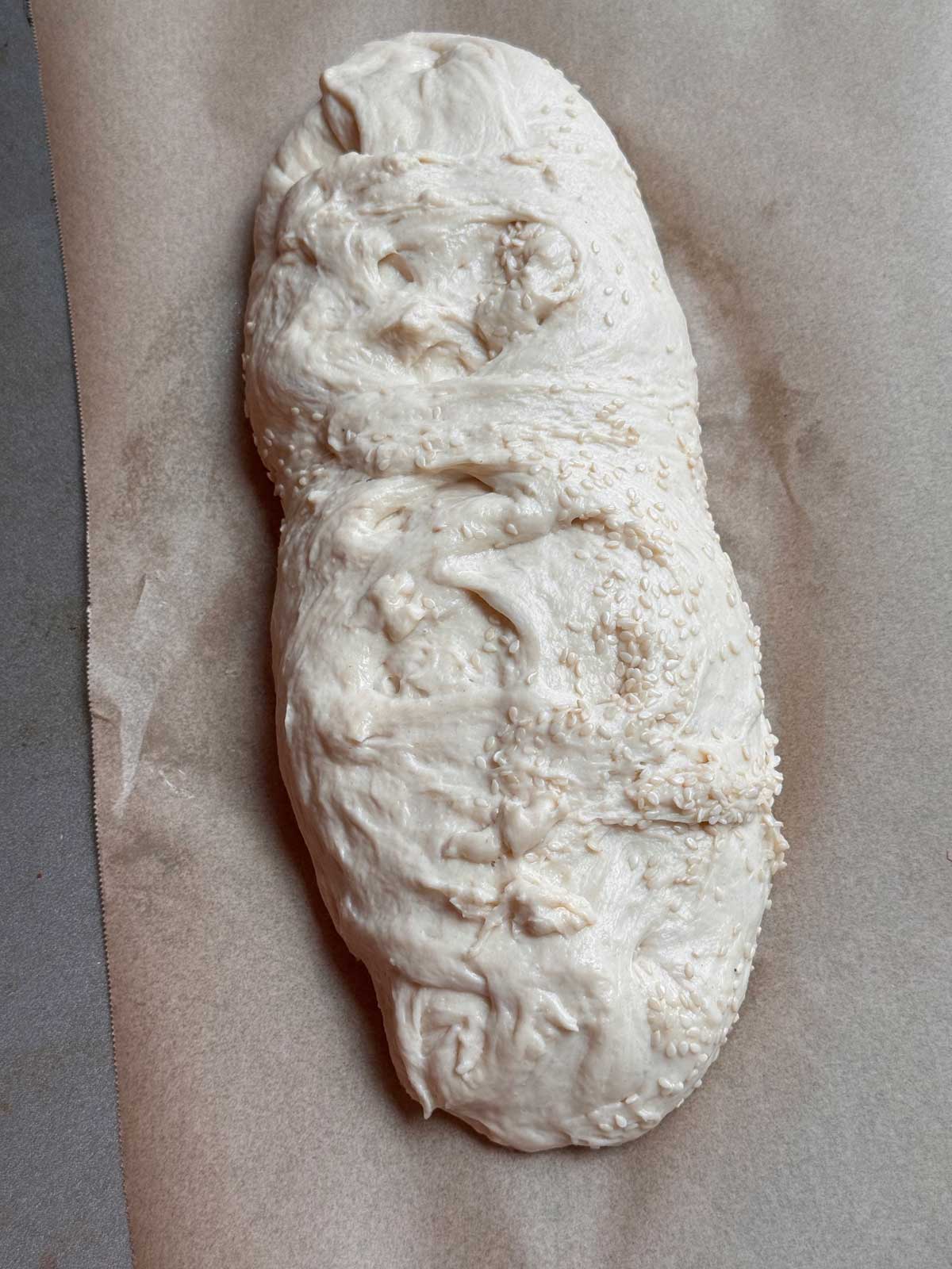 Italian bread dough with semolina and sesame seeds before the second rise.
