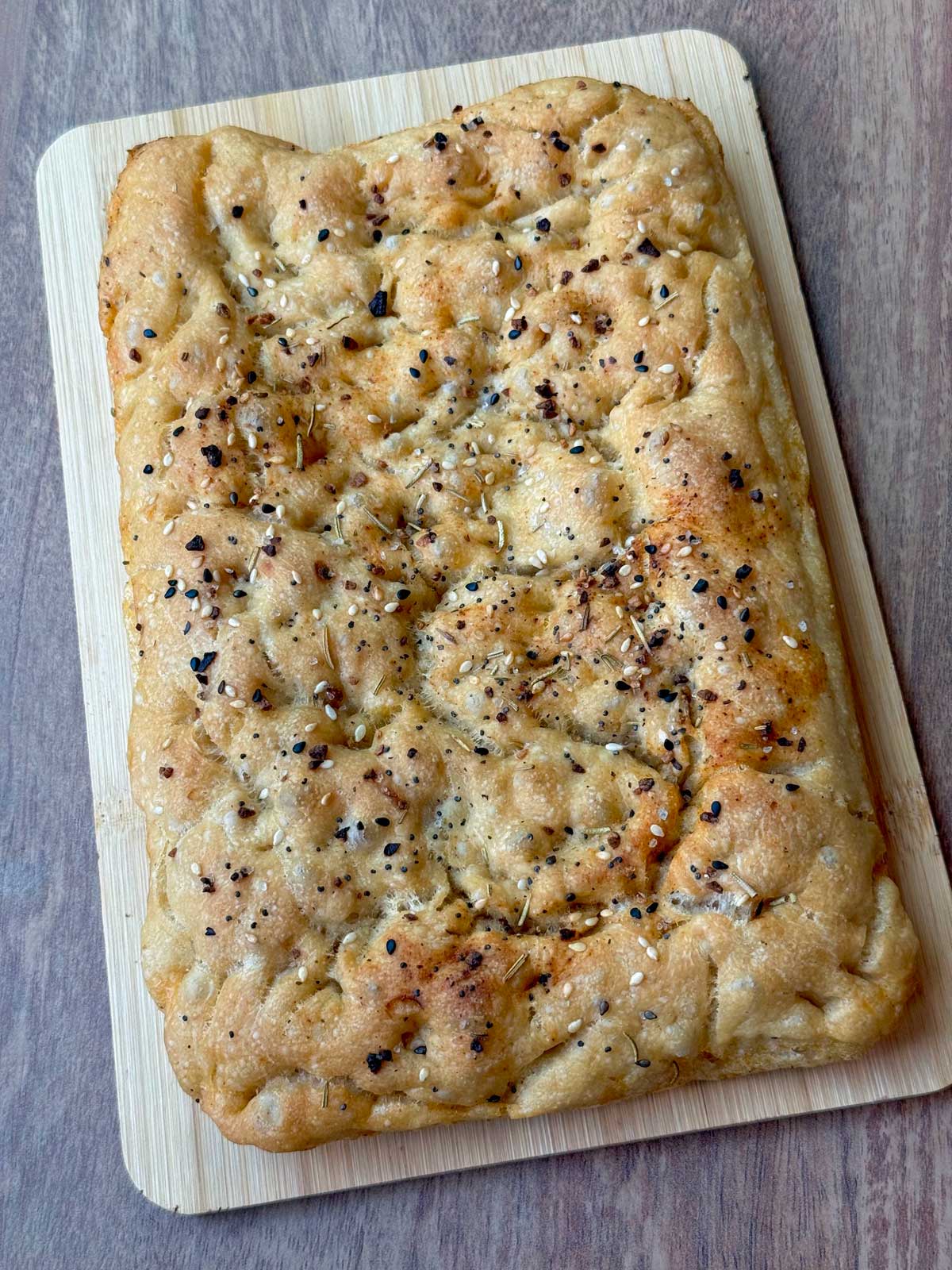 Easy sourdough focaccia baked in a mini sheet pan or ⅛ sheet pan.