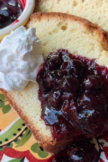 Recipe for Orange Loaf Cake with basic blueberry sauce flavored with Grand Marnier.