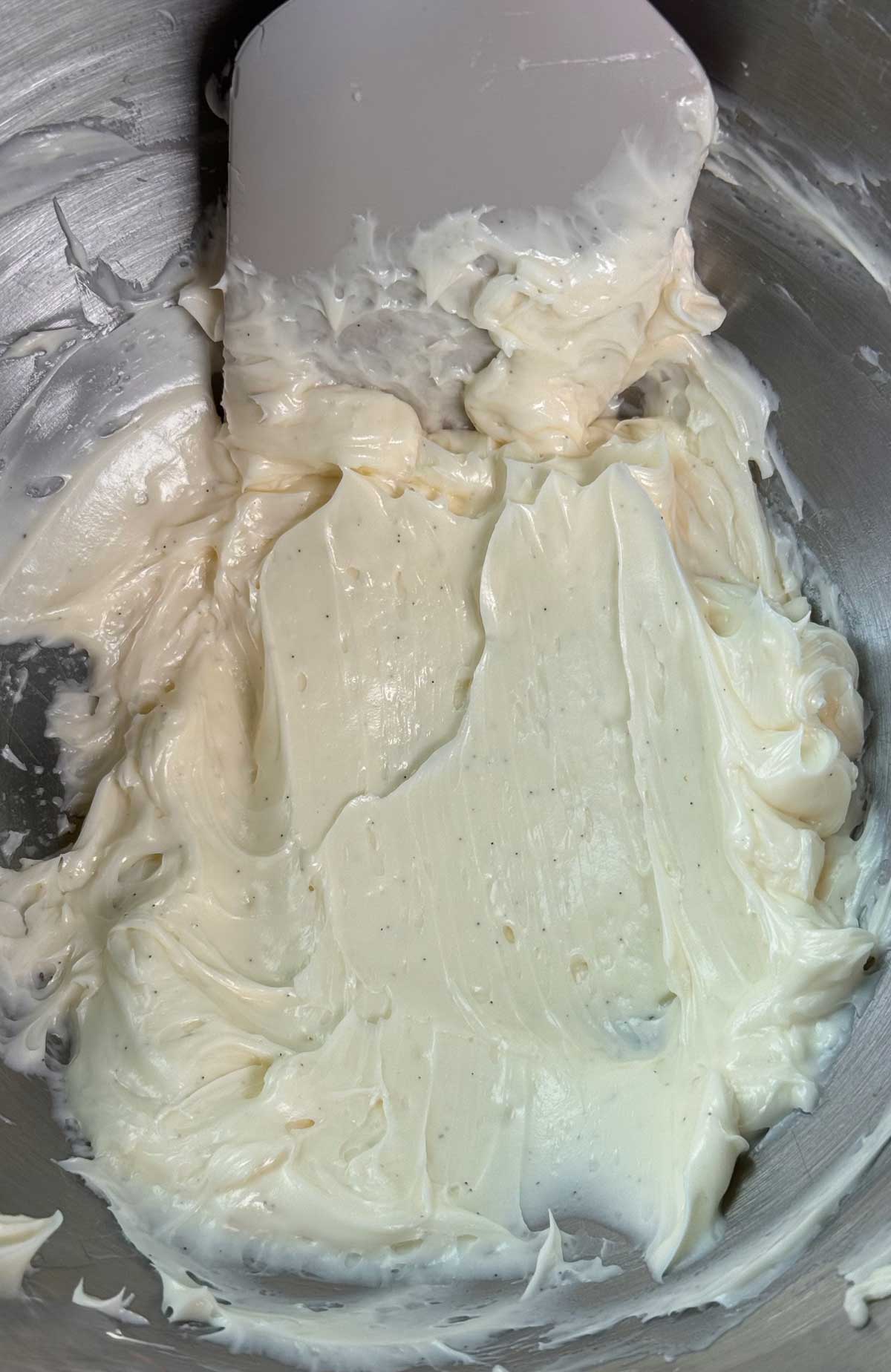 Easy vanilla buttercream frosting recipe showing texture of whipped frosting.